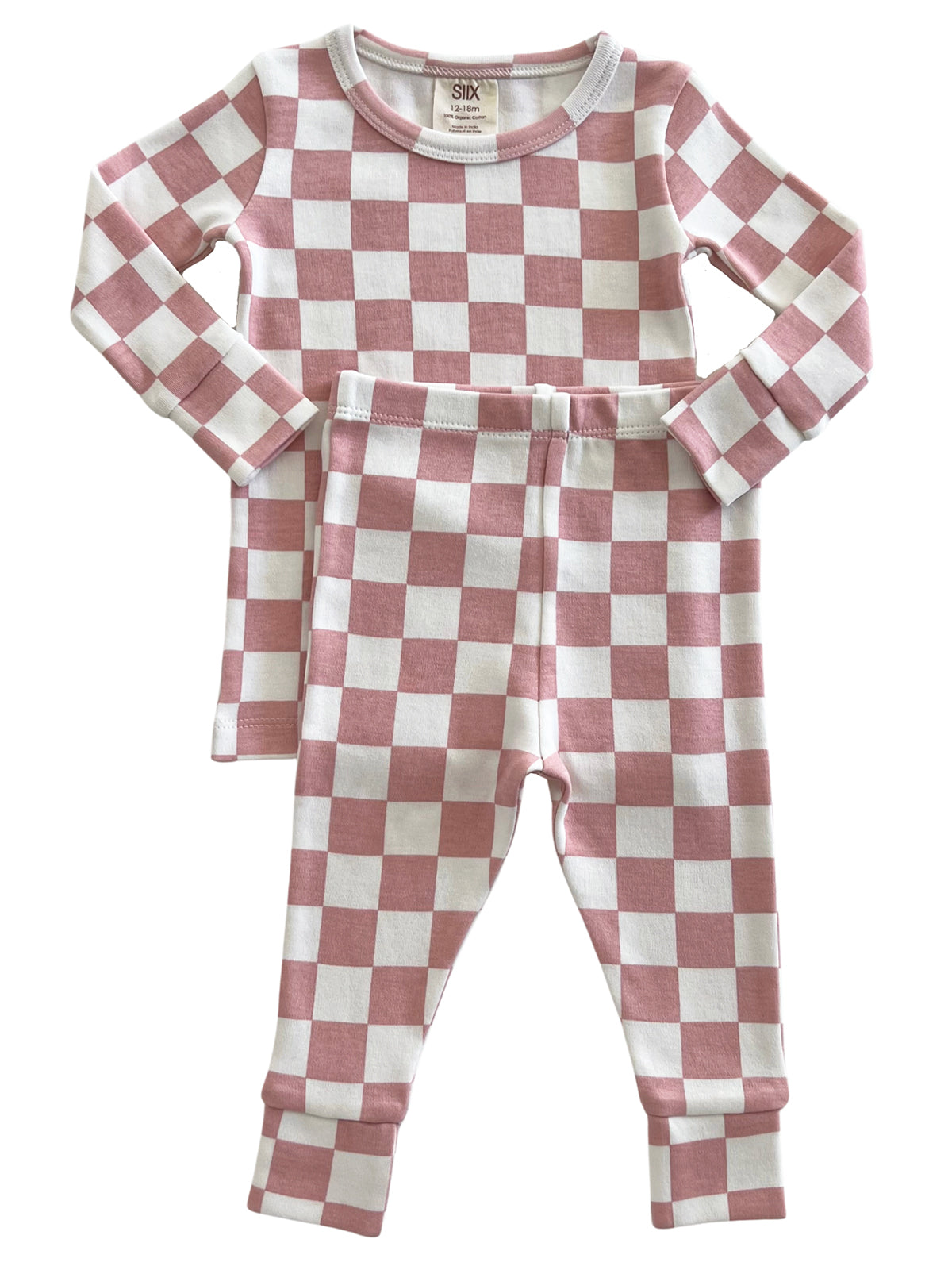 Child's checkered pajama set in pink and white, featuring long sleeves and elastic waistband pants.