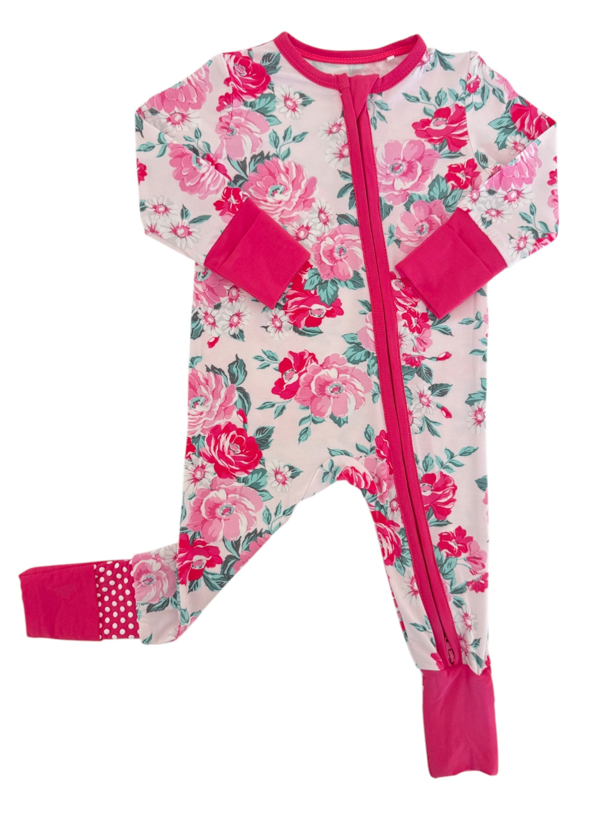 Girls' floral pajama onesie in pink with a front zipper and contrasting cuffs. Perfect for cozy sleepwear.