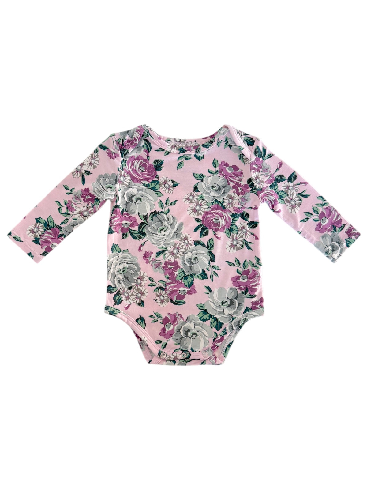 Floral long-sleeve baby onesie in pink, featuring roses and greenery design on soft fabric.