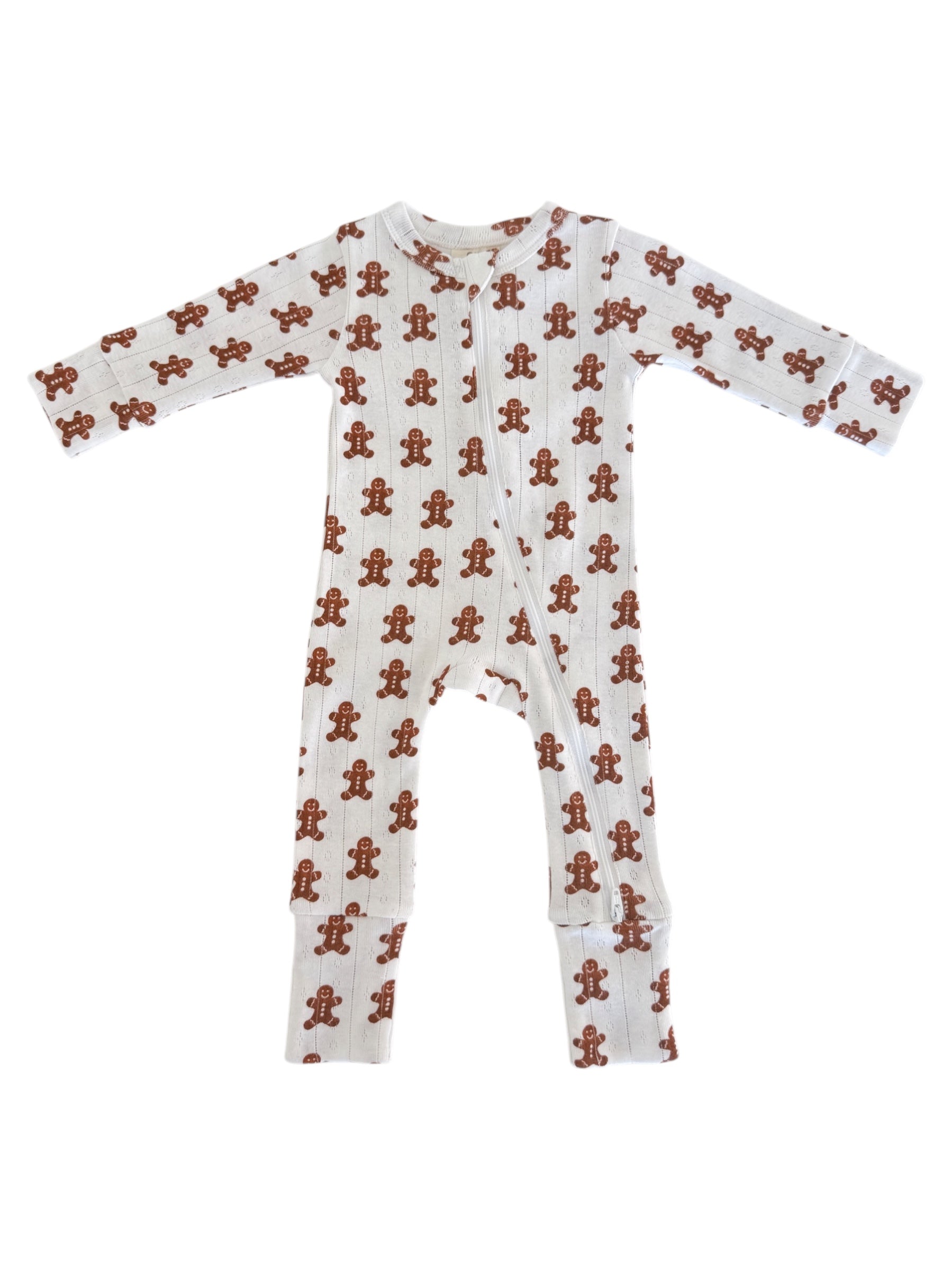Gingerbread-patterned baby onesie with long sleeves and a front zipper, ideal for winter wear.
