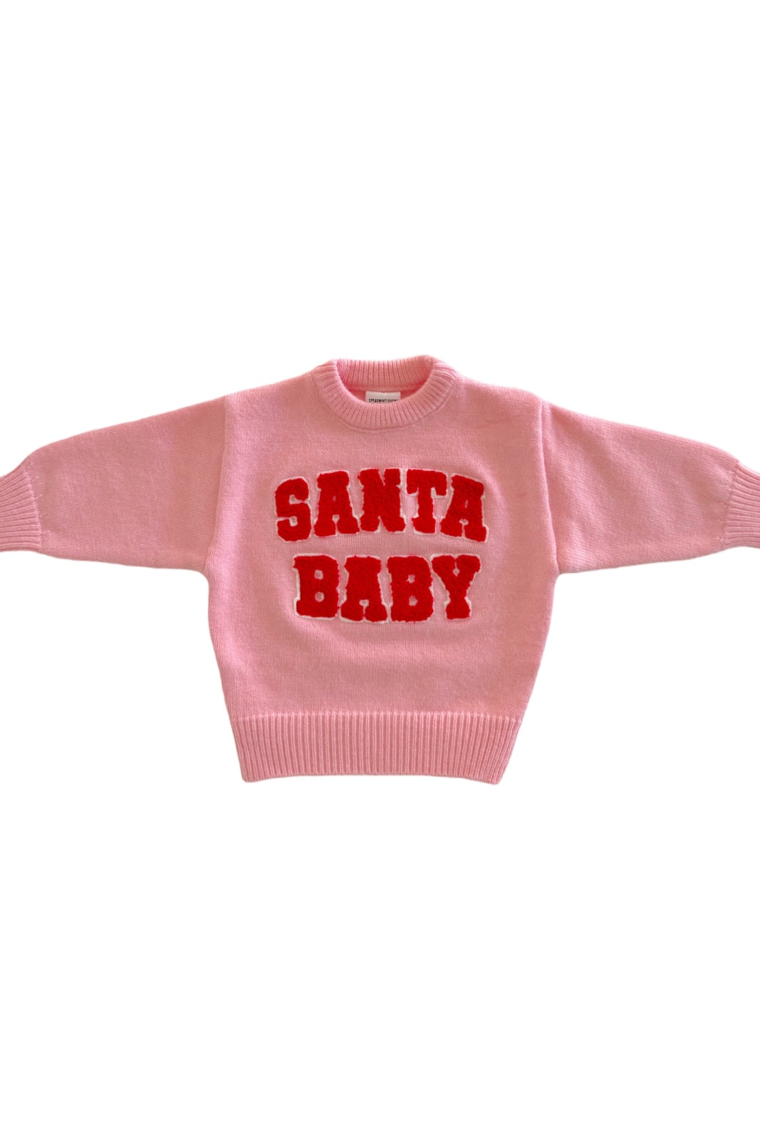 Oversized pink sweater with the text "SANTA BABY" in bold red letters. Perfect for festive occasions.