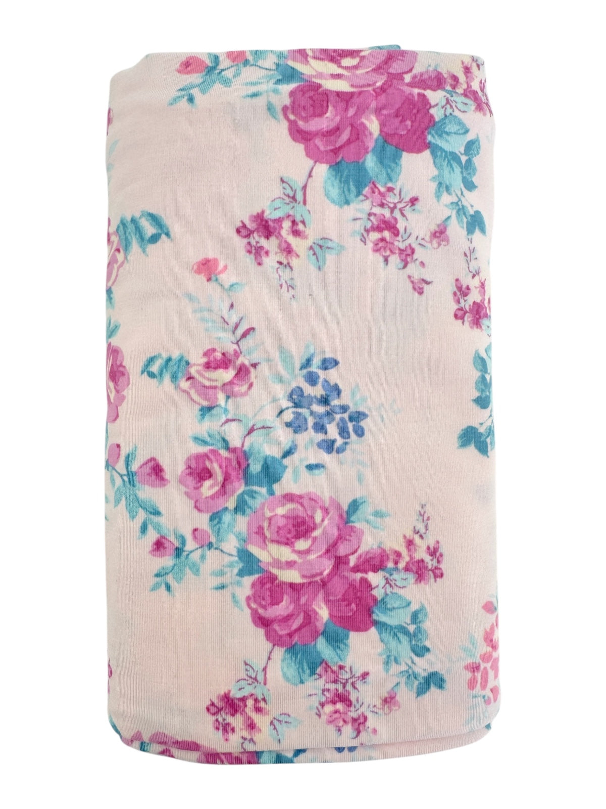 Floral-patterned fabric in pink and blue hues, folded neatly. Perfect for crafts or home decor.