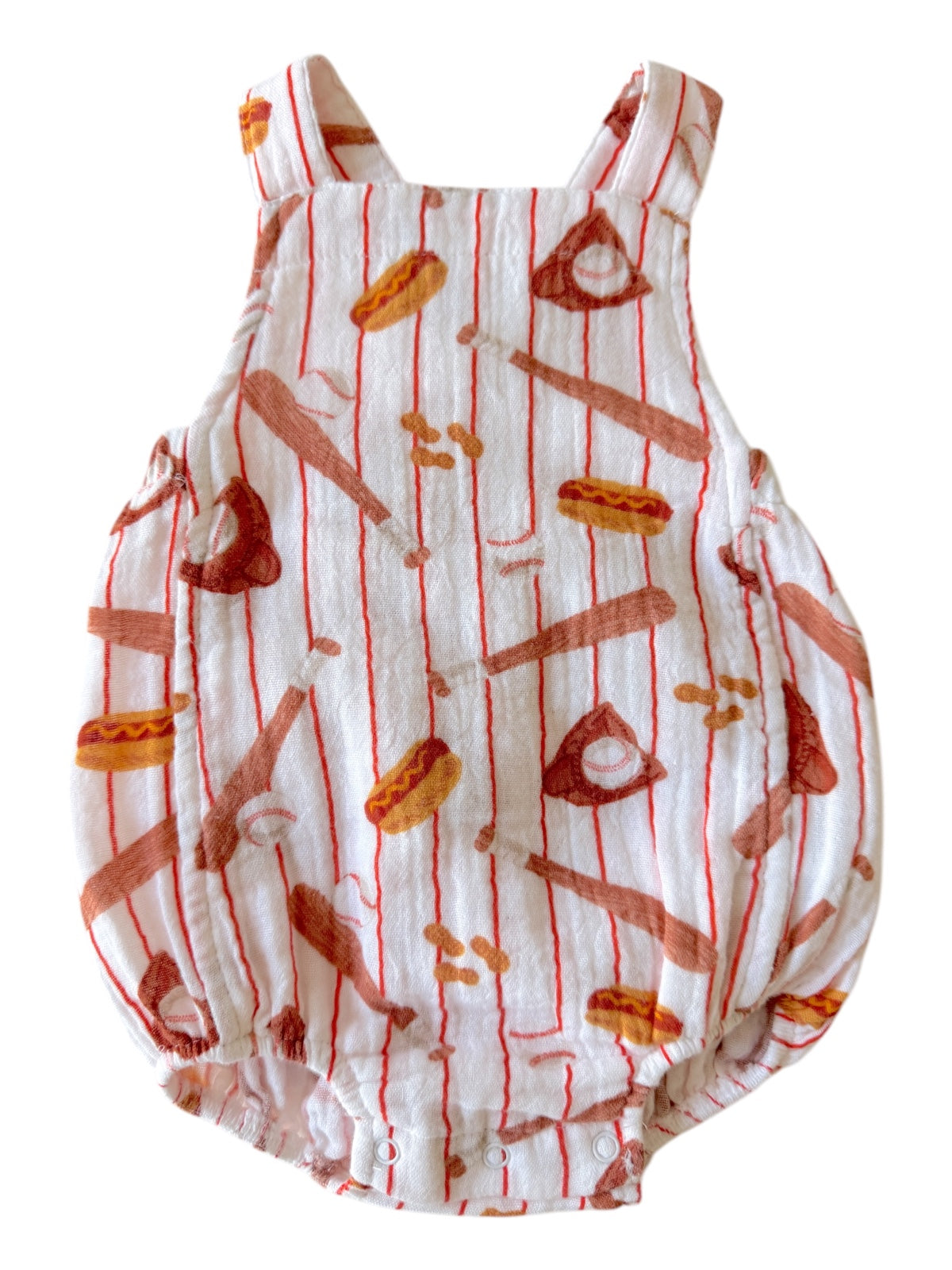 Youth romper with food and baseball print on a white background, featuring red striped detailing.