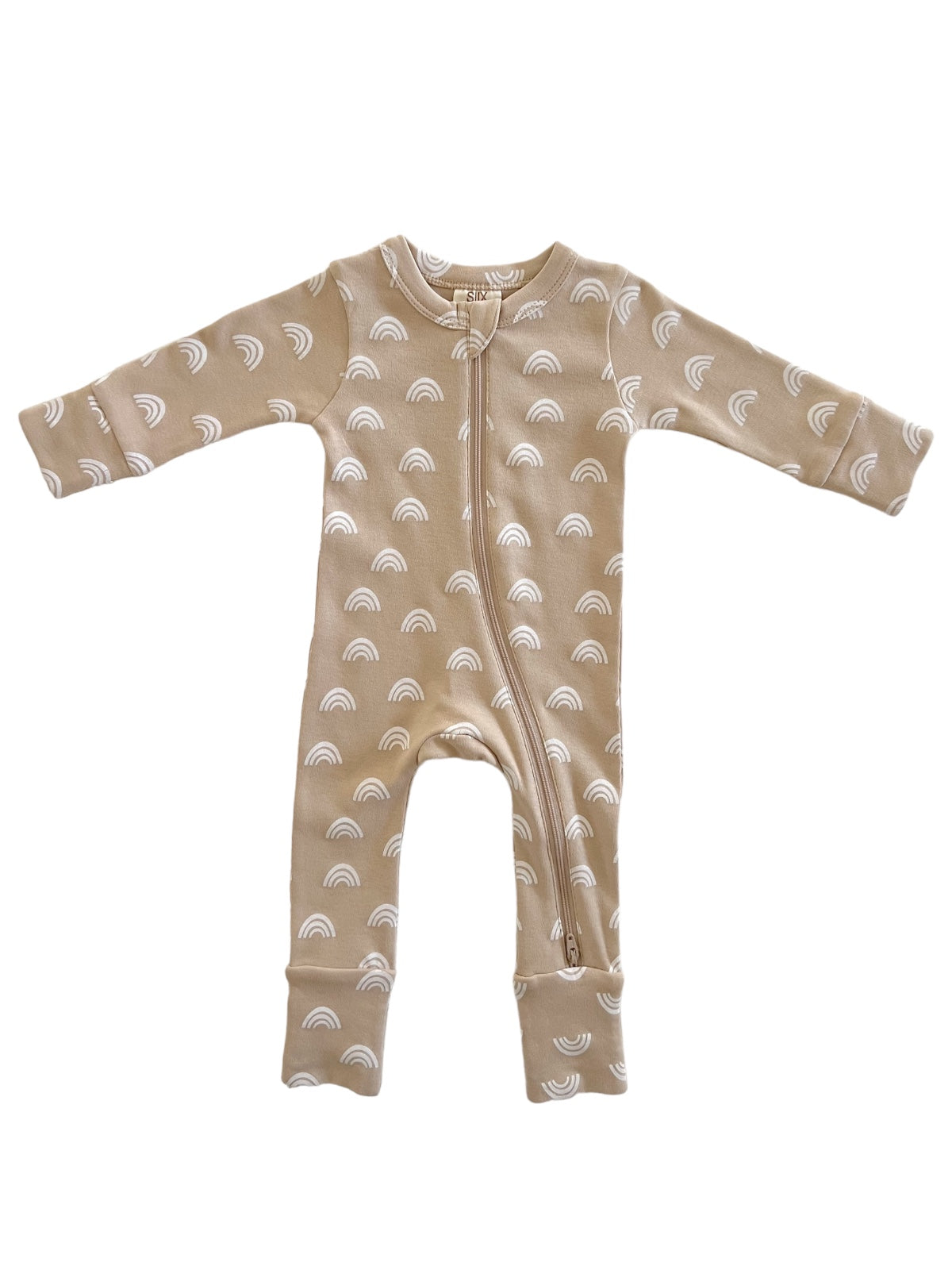 Tan baby onesie with white rainbow patterns, featuring a full front zipper and long sleeves.