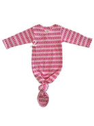 Baby sleep sack in pink with heart patterns, featuring long sleeves and a knotted bottom for easy diaper changes.
