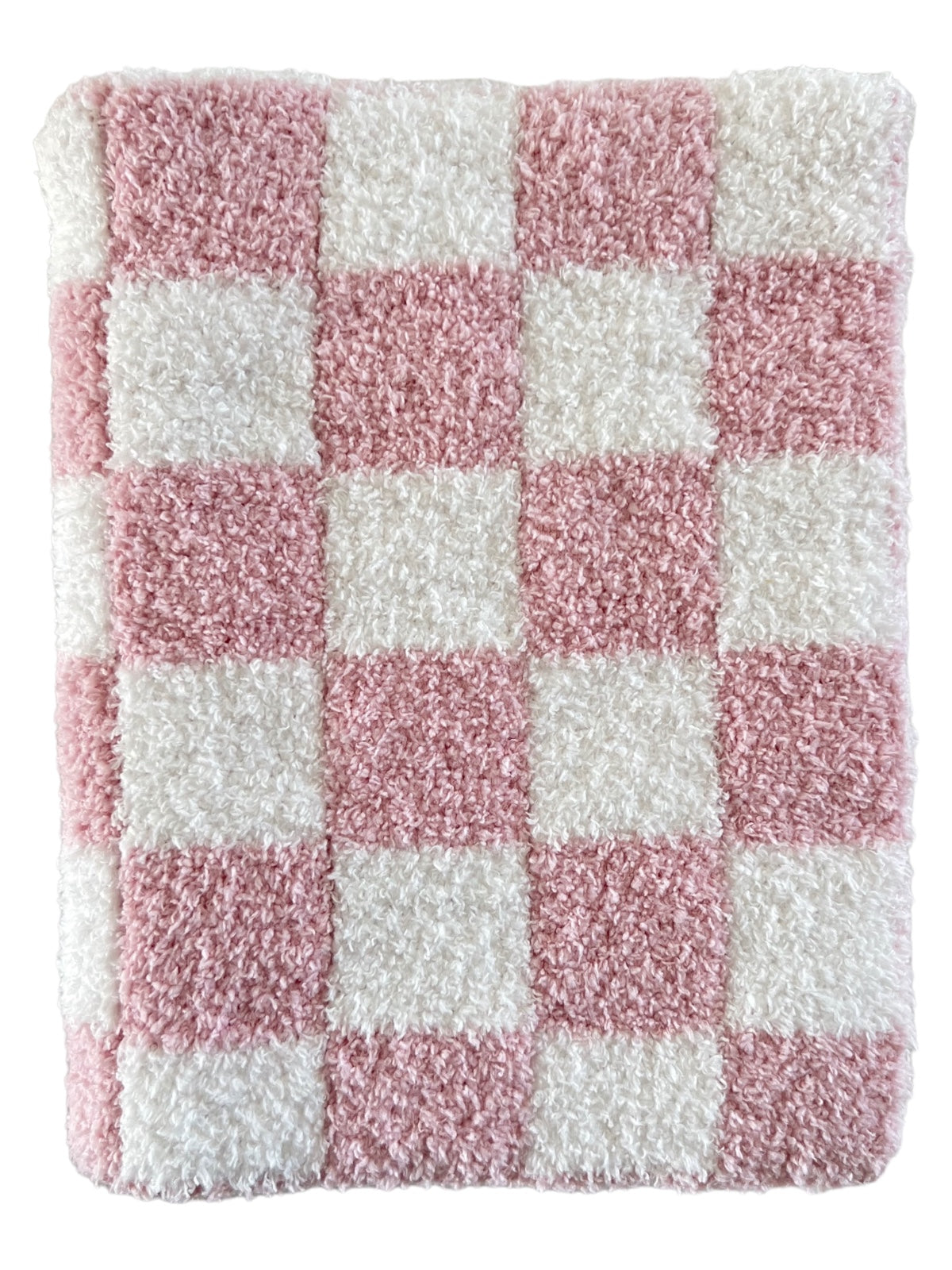 Pink and white checkered fluffy rug, featuring a soft texture and a bold pattern.