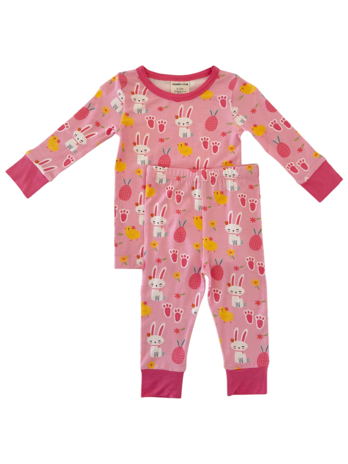 Pink children's pajamas with bunny and chick patterns, featuring long sleeves and matching pants.