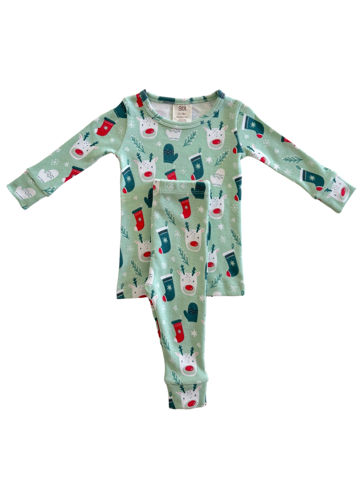 Green holiday pajama set featuring reindeer and mittens patterns, suitable for kids.