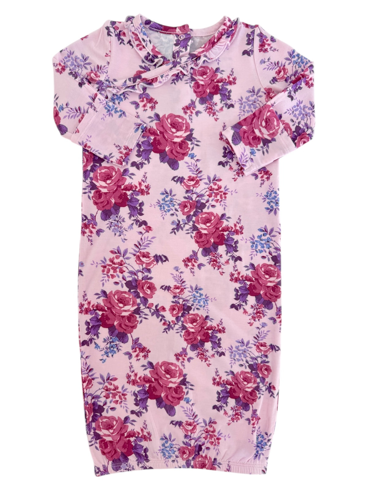 Pink floral nightgown featuring long sleeves and a ruffled neckline with a mix of purple and red roses.