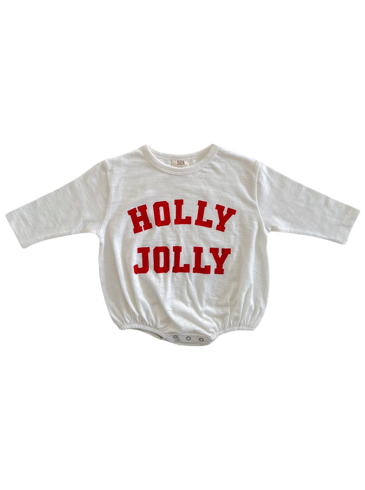 White long-sleeve onesie with red text reading "HOLLY JOLLY" on the front.