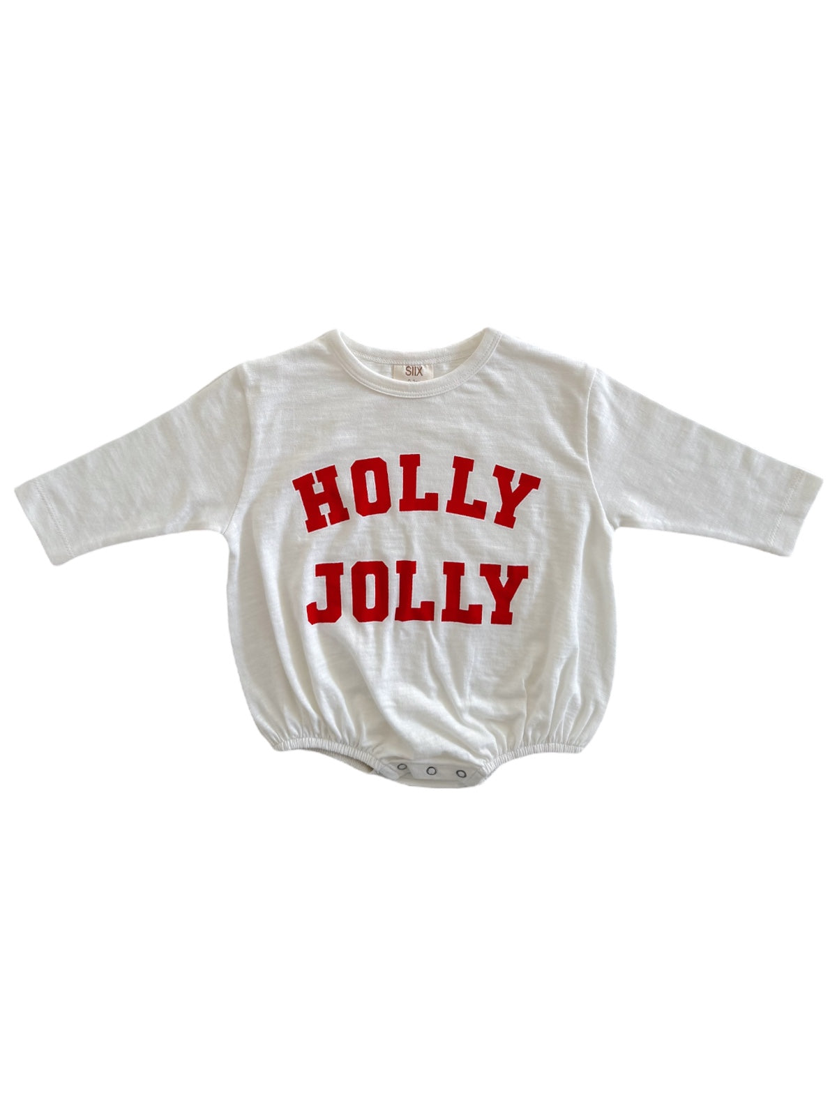 White long-sleeve onesie with red text reading "HOLLY JOLLY" on the front.