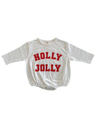 White long-sleeve onesie with red text reading "HOLLY JOLLY" on the front.