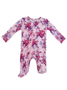 Pink floral baby onesie with long sleeves and a front zipper, featuring ruffled edges and a polka dot foot.