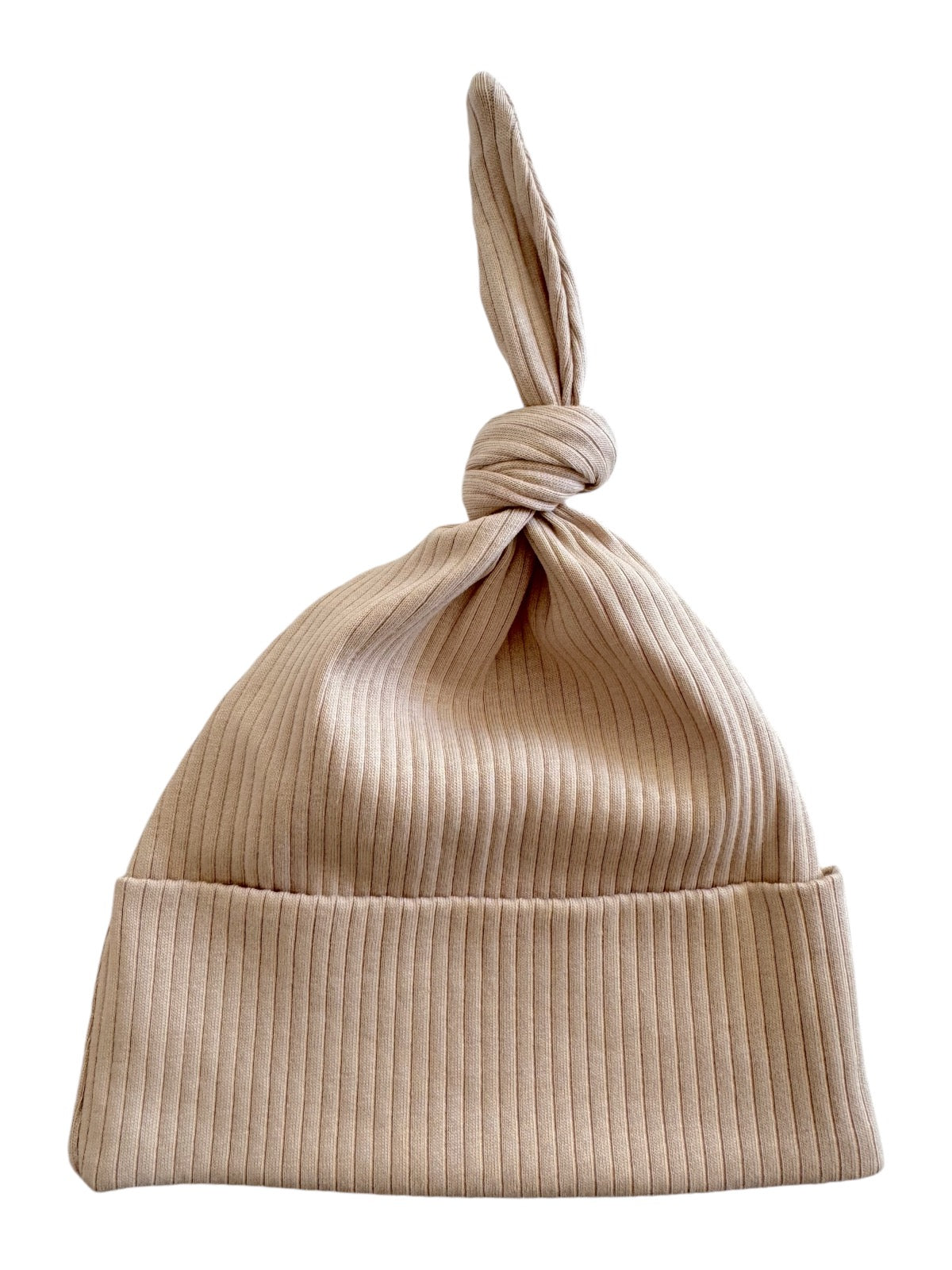 Tan ribbed knit hat with a knot at the top, suitable for casual wear in cooler weather.