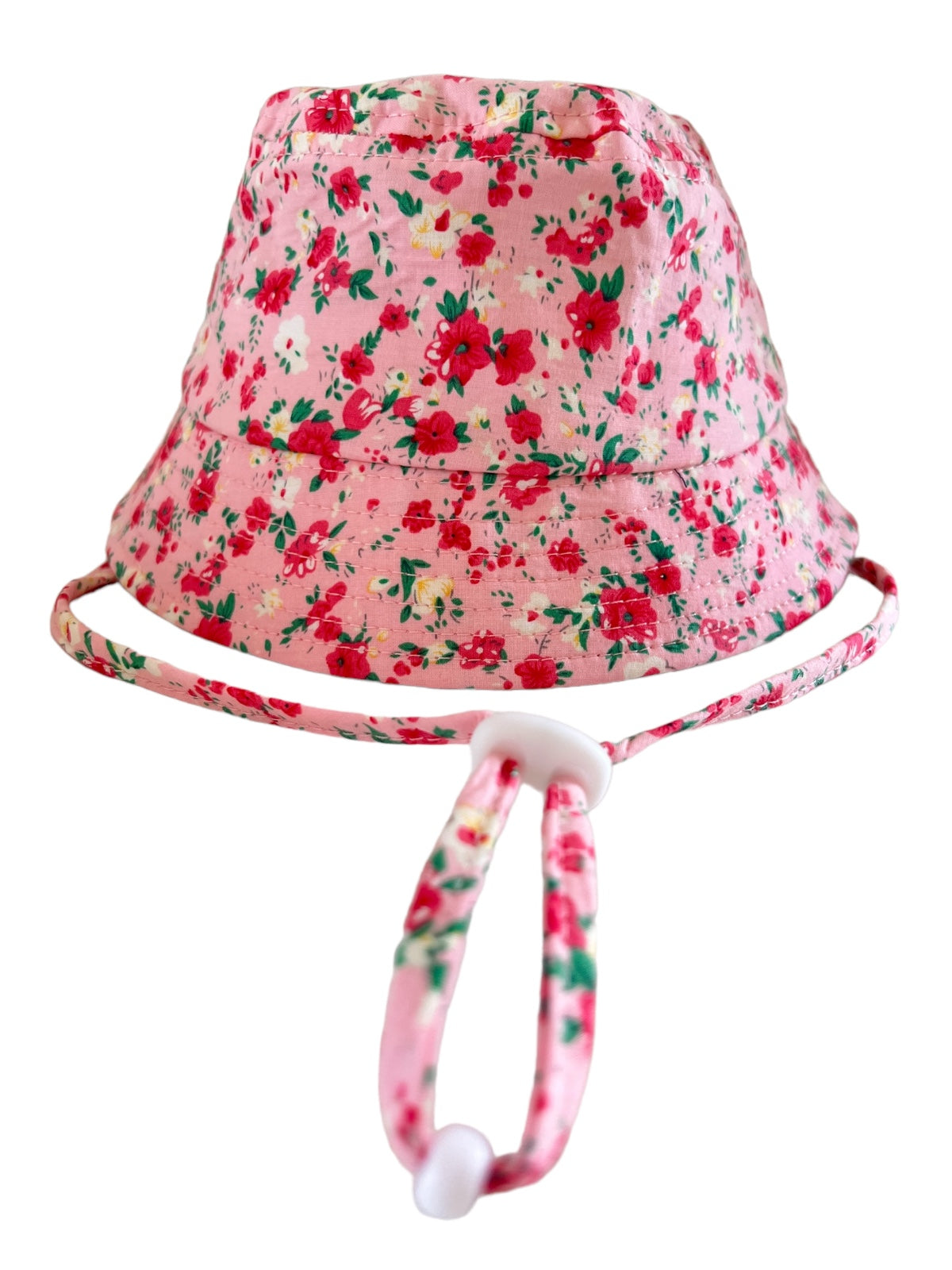 Floral-patterned pink bucket hat with chin strap, ideal for sun protection and stylish outdoor wear.