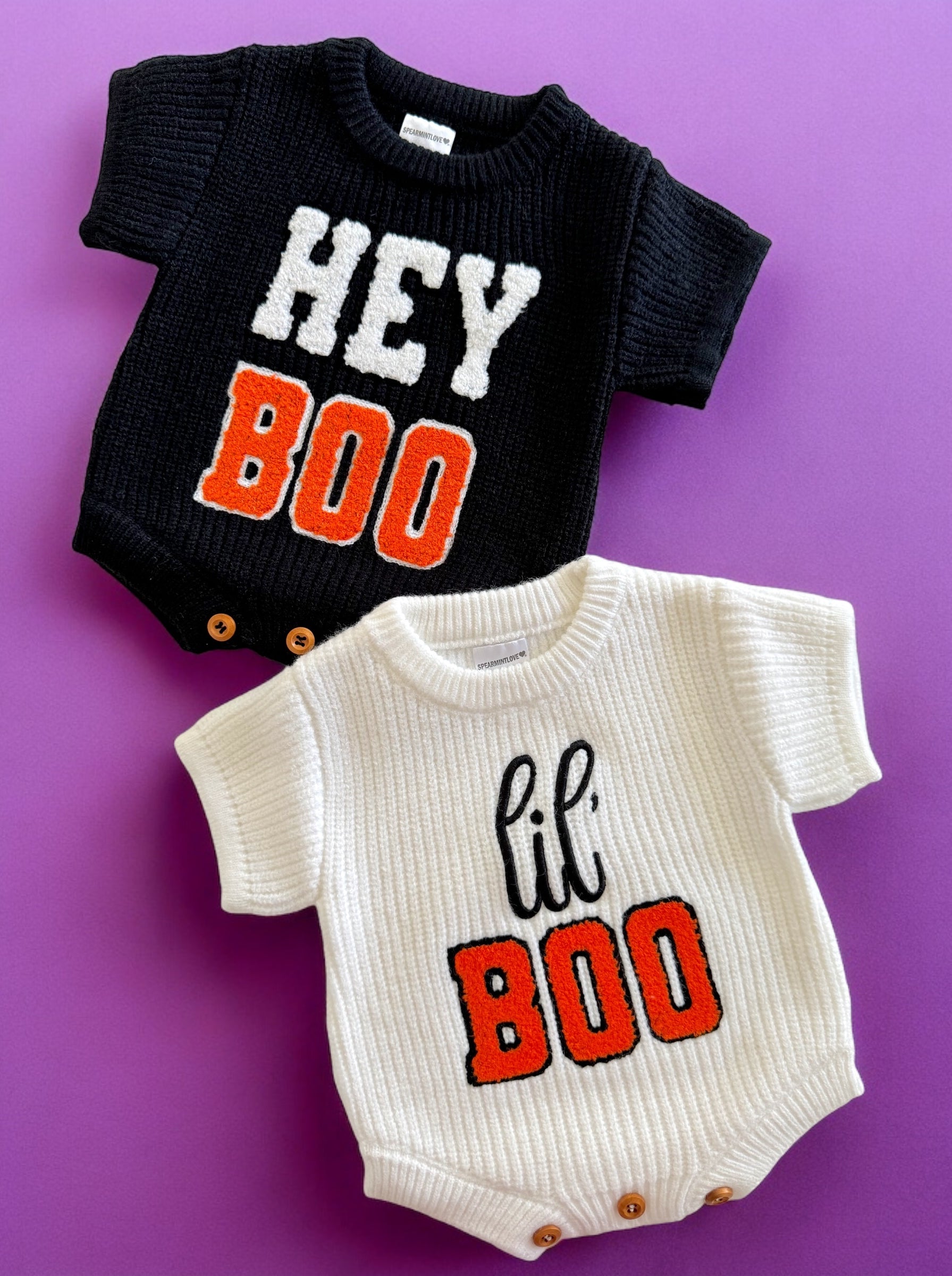 Black and white baby onesies with "HEY BOO" and "lil' BOO" text on a purple background.