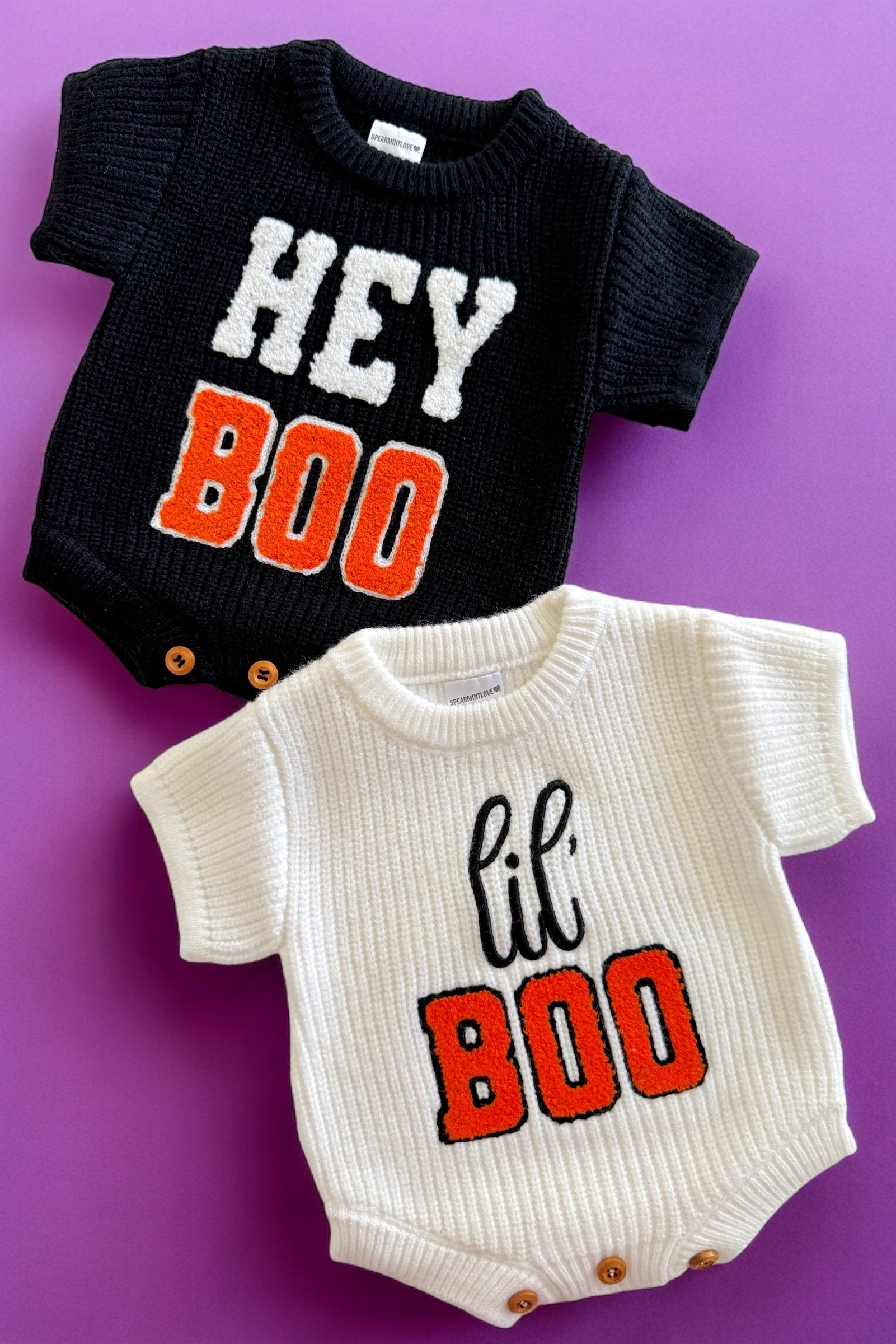 Black and white baby onesies with "HEY BOO" and "lil' BOO" text on a purple background.