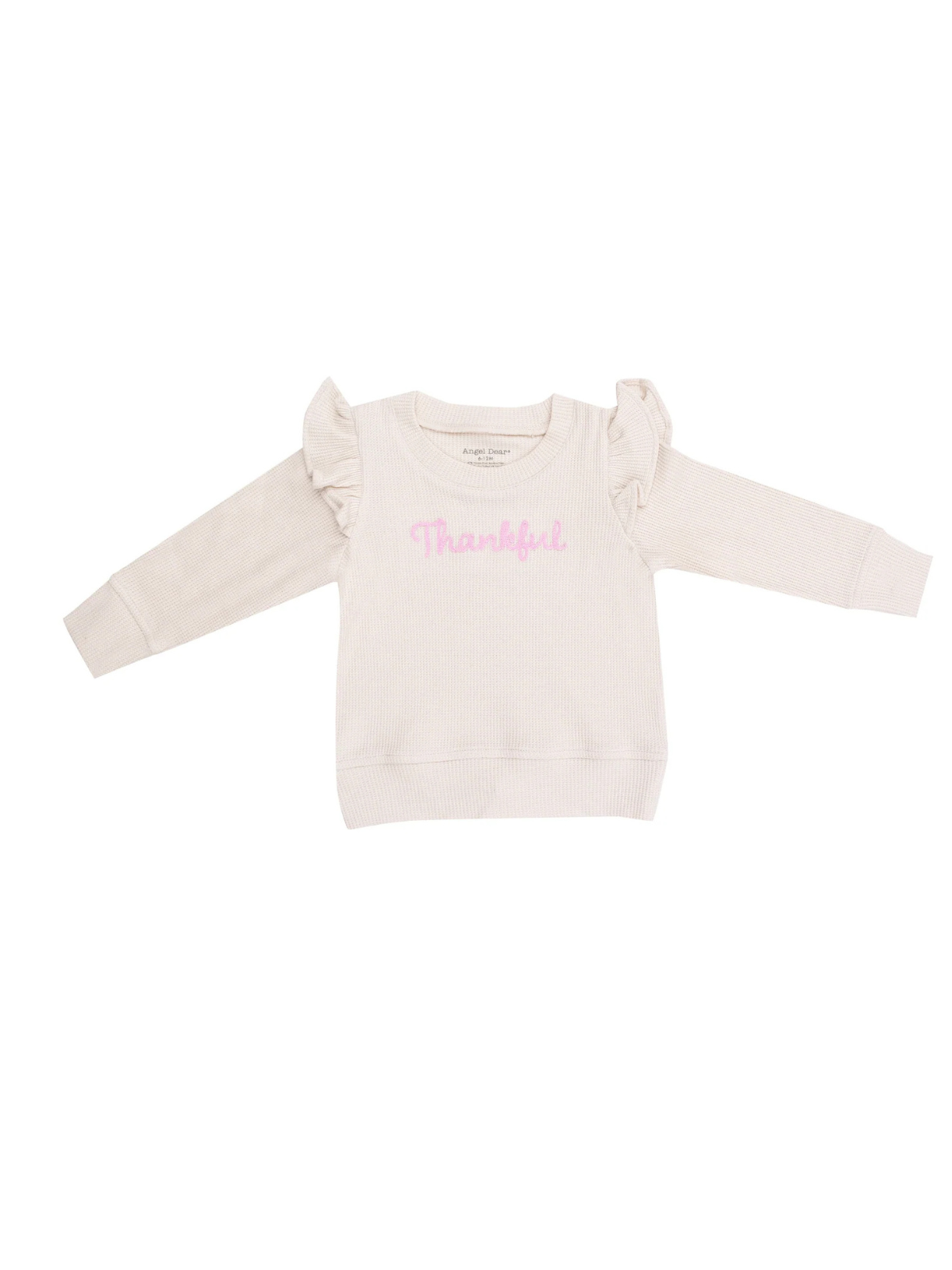 Light beige sweater with ruffled sleeves, featuring the word "Thankful" in pink.