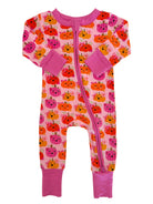 Children's pink onesie with playful pumpkin print, featuring long sleeves and a zipper closure.