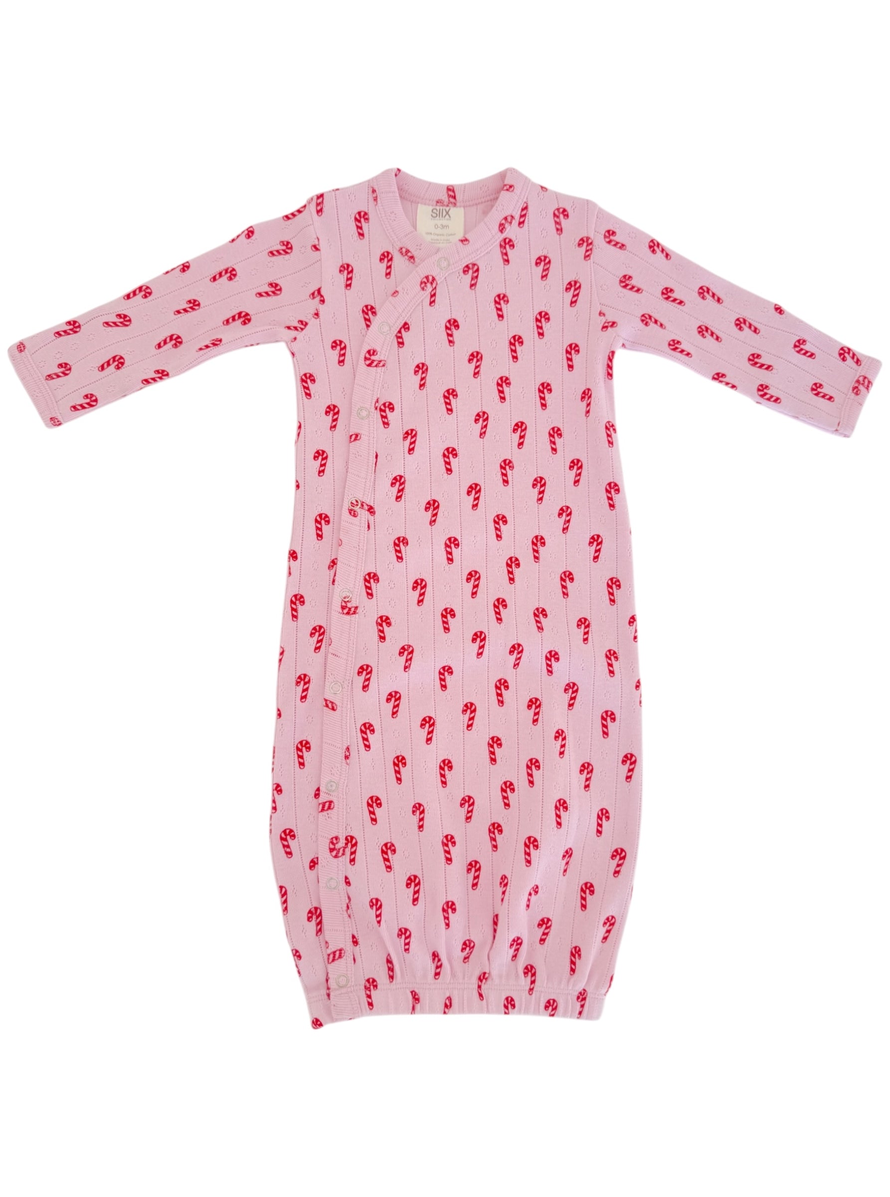 Pink baby gown with candy cane pattern and long sleeves, featuring snap buttons for easy dressing.