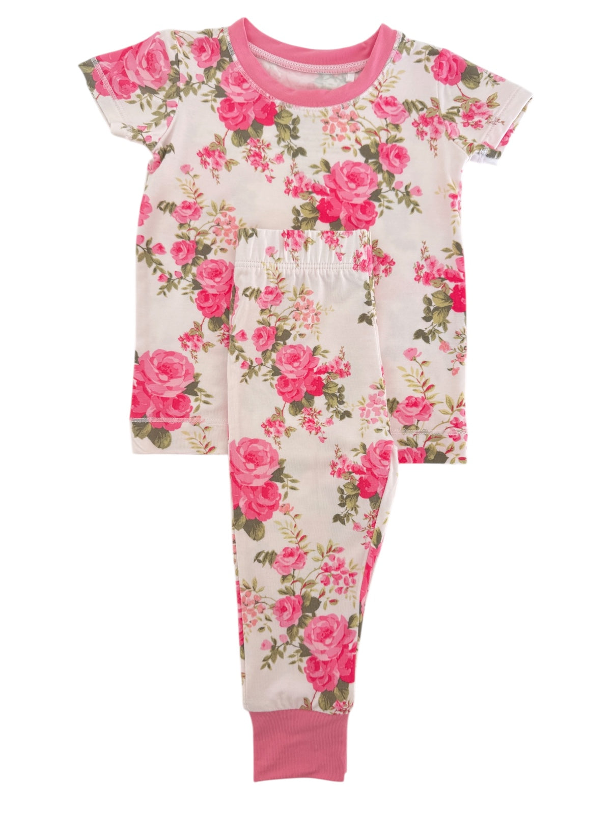 Floral pajama set with short sleeves and elastic waistband, featuring a pink rose pattern on a cream background.