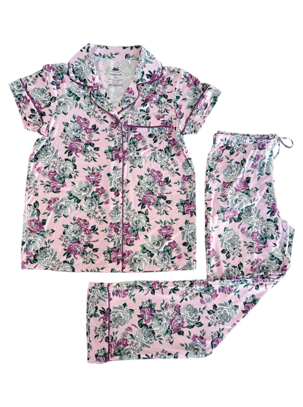 Pink floral pajama set featuring a short-sleeve top and long pants, adorned with gray and purple roses.