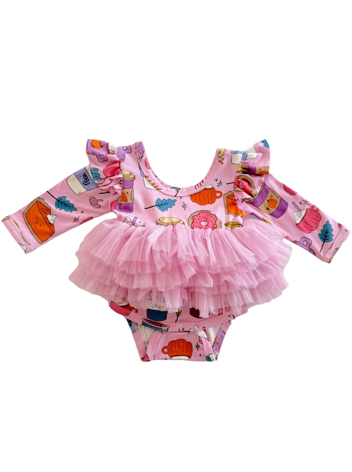 Pink ruffled toddler swimsuit with fun dessert prints on the fabric. Ideal for playful summer outings.