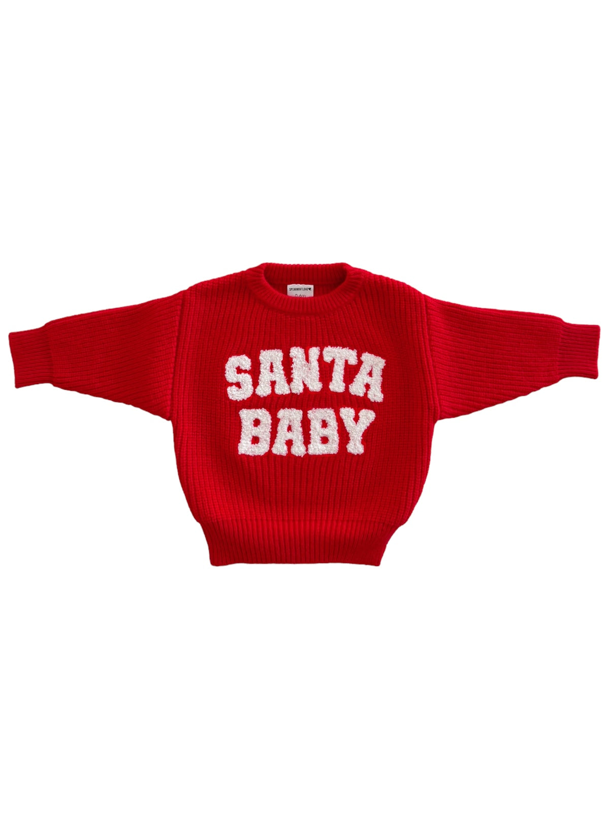 Red sweater with the text "SANTA BABY" in white, featuring a ribbed texture and oversized sleeves.