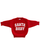 Red sweater with the text "SANTA BABY" in white, featuring a ribbed texture and oversized sleeves.