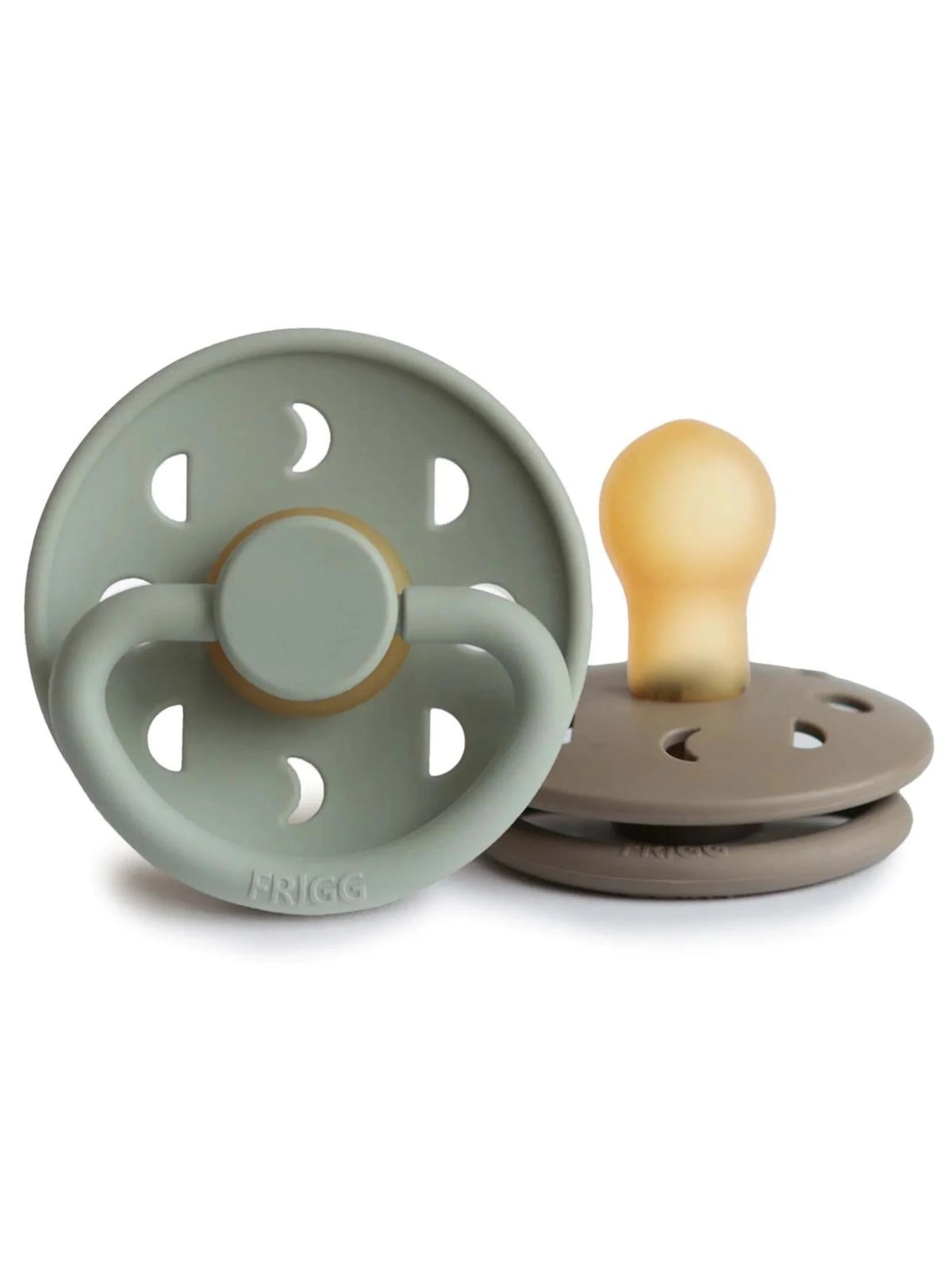 Two silicone pacifiers in green and brown, featuring round shapes with ventilation holes and a soft nipple.