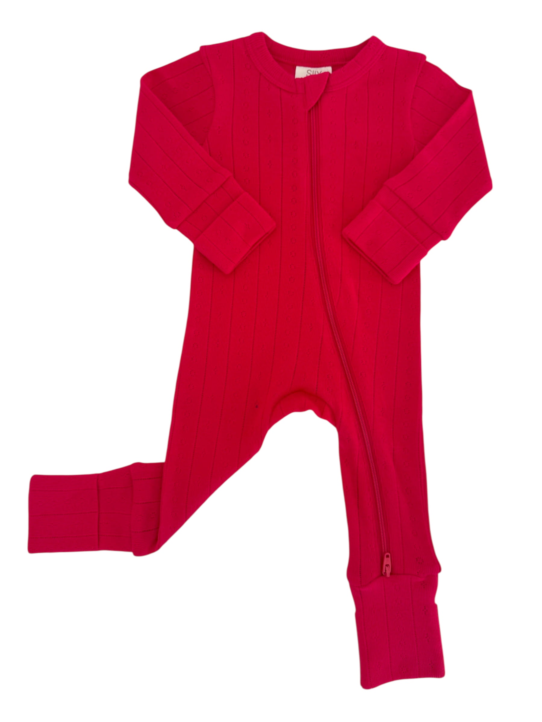 Bright pink children's onesie with a zipper and long sleeves, featuring ribbed detailing.