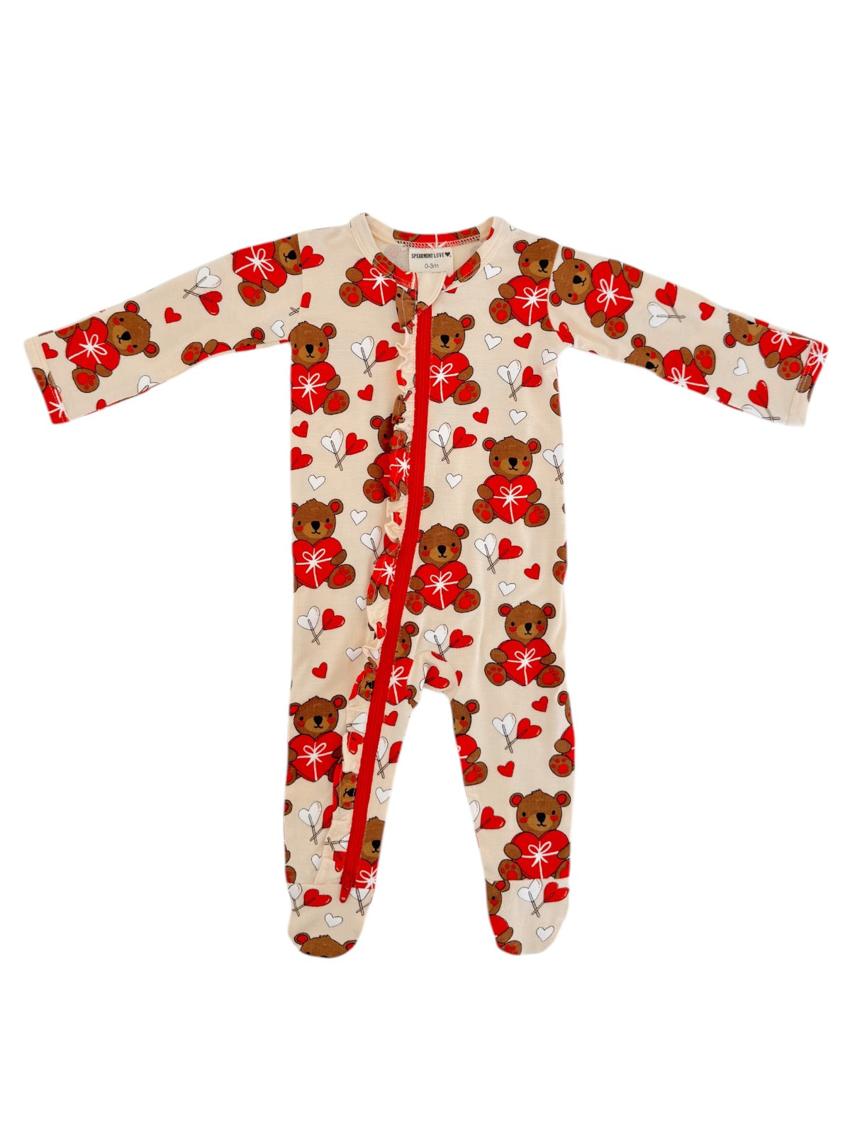 Baby onesie with bear and heart print, featuring long sleeves and a front zipper closure.