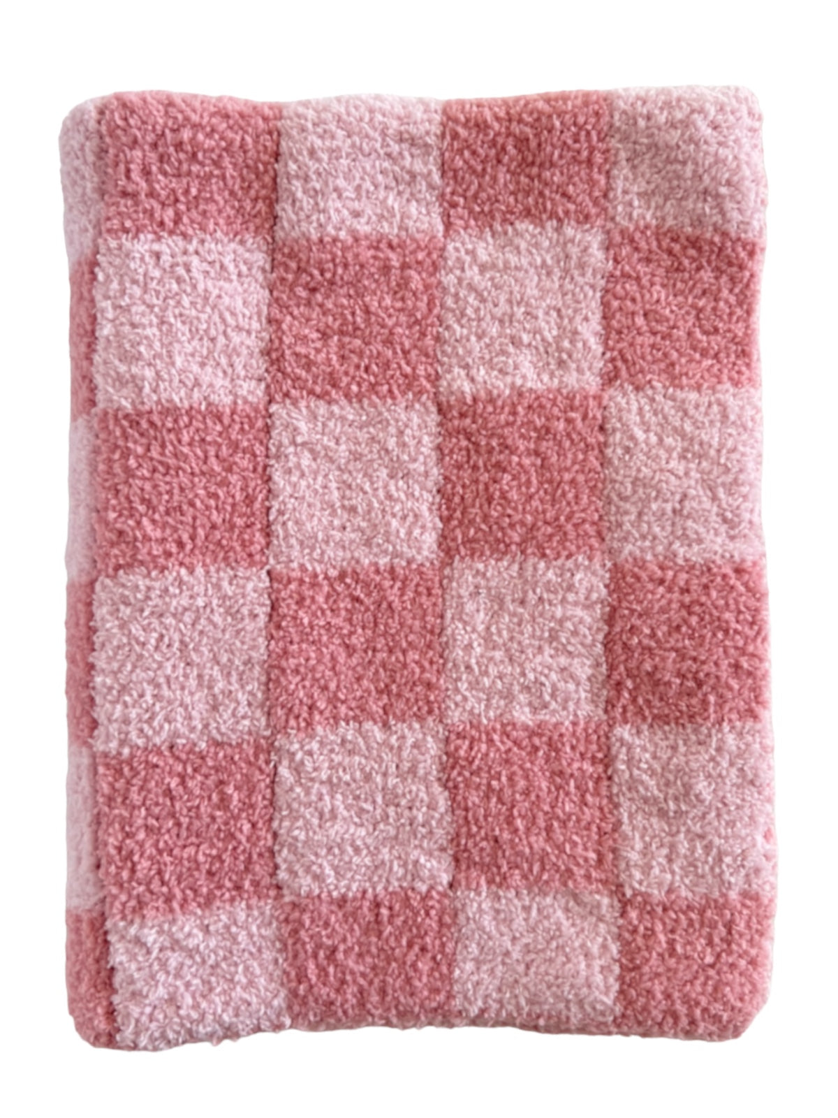 Pink checkered blanket with soft texture, featuring alternating light and dark pink squares. Ideal for cozy warmth.