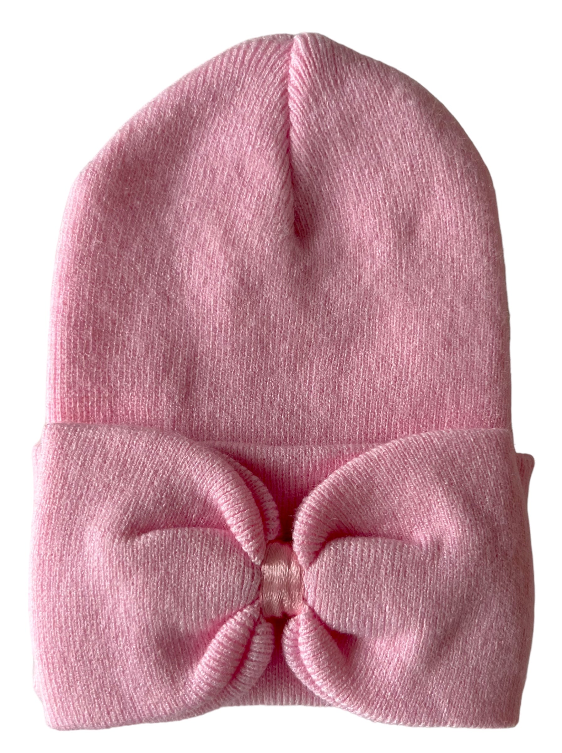 Pink knit beanie with a large bow detail at the front, folded cuff at the bottom. Suitable for kids or fashion.