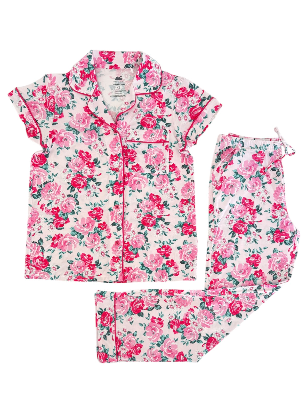 Floral pink and white pajama set featuring a short-sleeve top and matching pants.