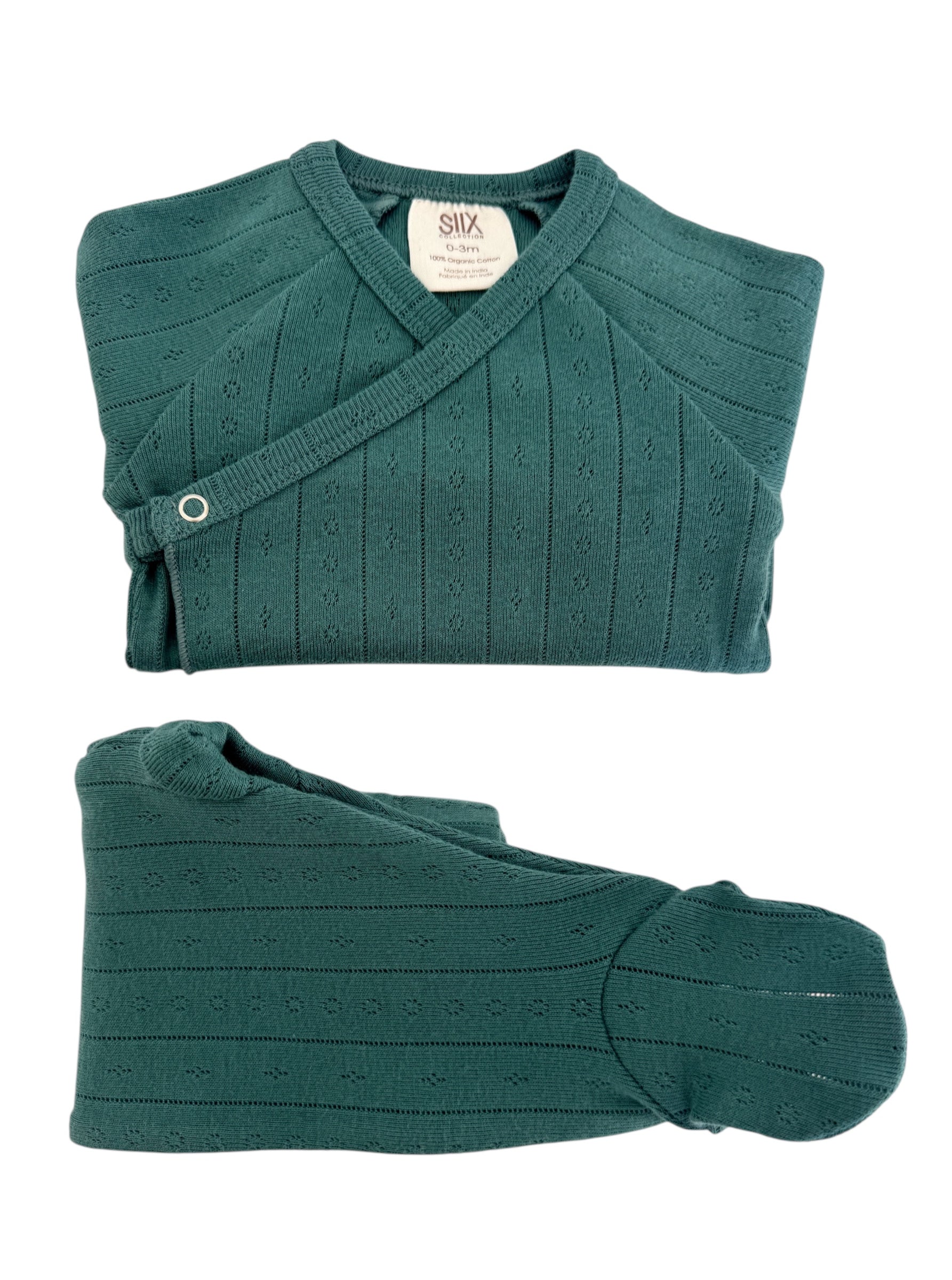 Green knitted baby sweater set displayed flat, featuring a wrap design and a textured pattern. Size: 0-3 months.