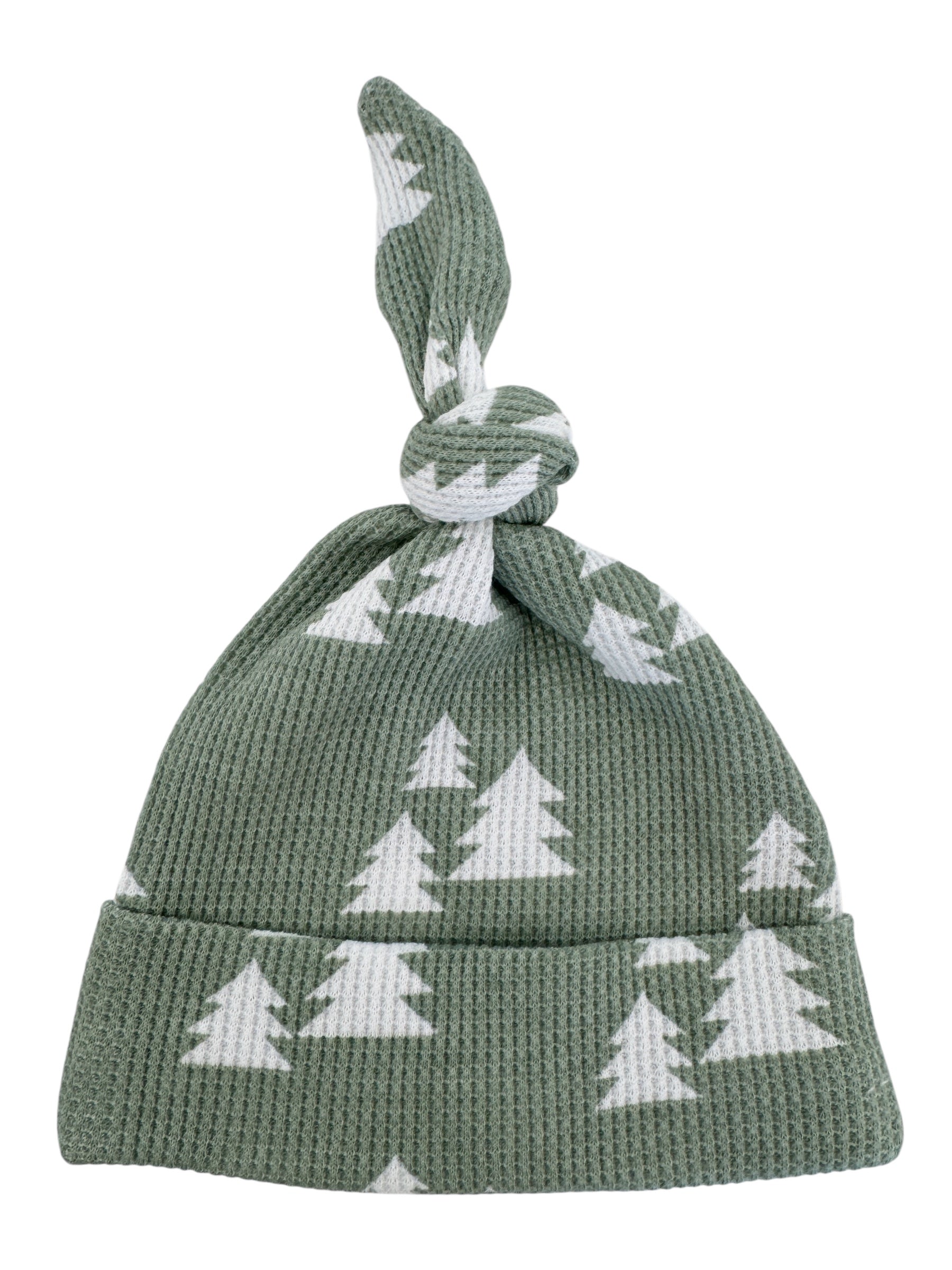 Green knit beanie with white tree patterns and a knotted top. Ideal for winter or festive occasions.