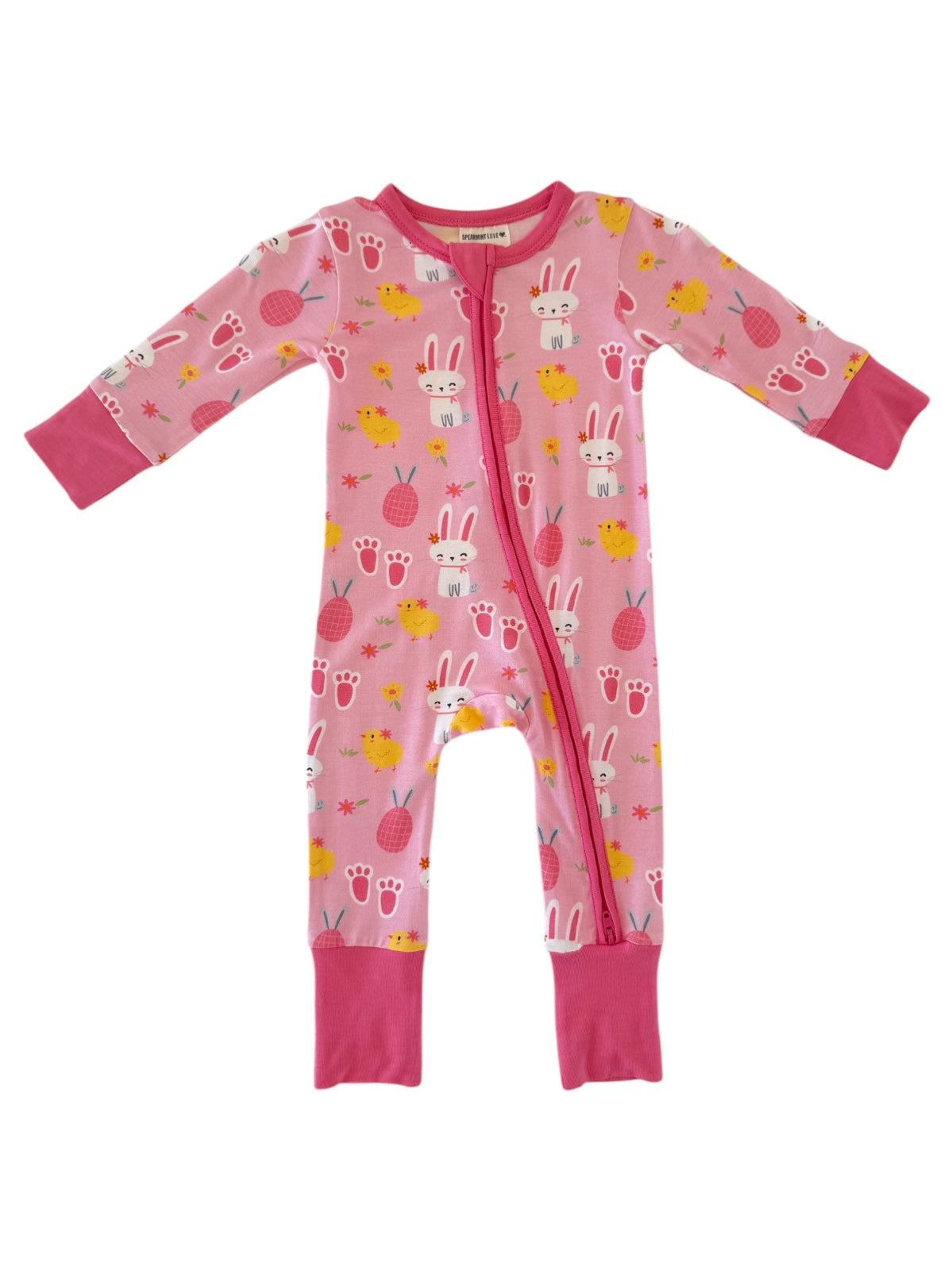 Pink baby onesie with bunny and chick patterns, featuring long sleeves and zip closure. Perfect for cozy wear.