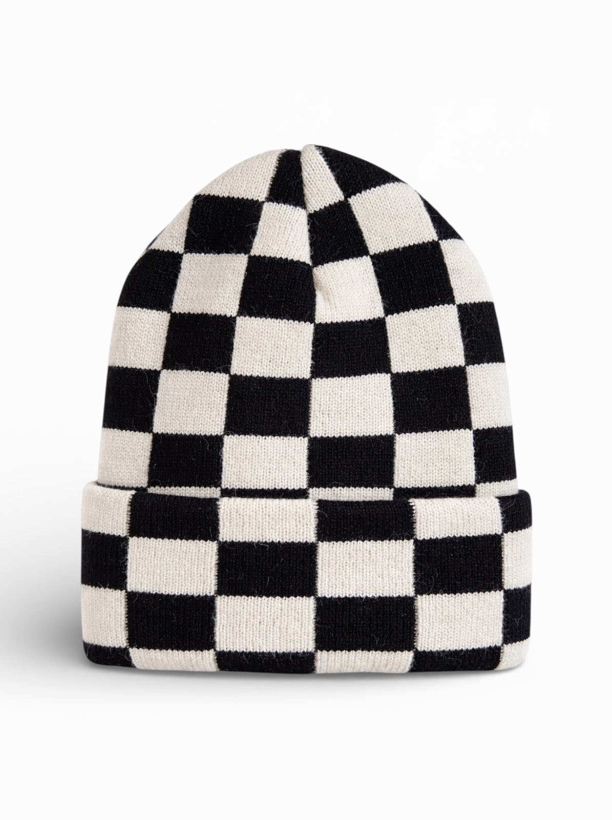 Black and white checkerboard patterned knit beanie hat with a folded cuff.