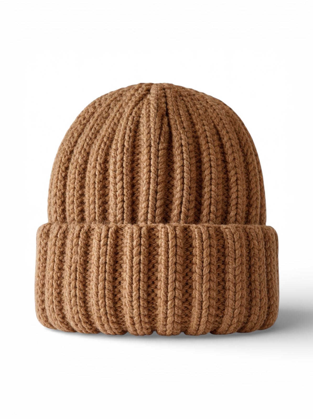 Knitted brown beanie with a ribbed texture placed against a light background.