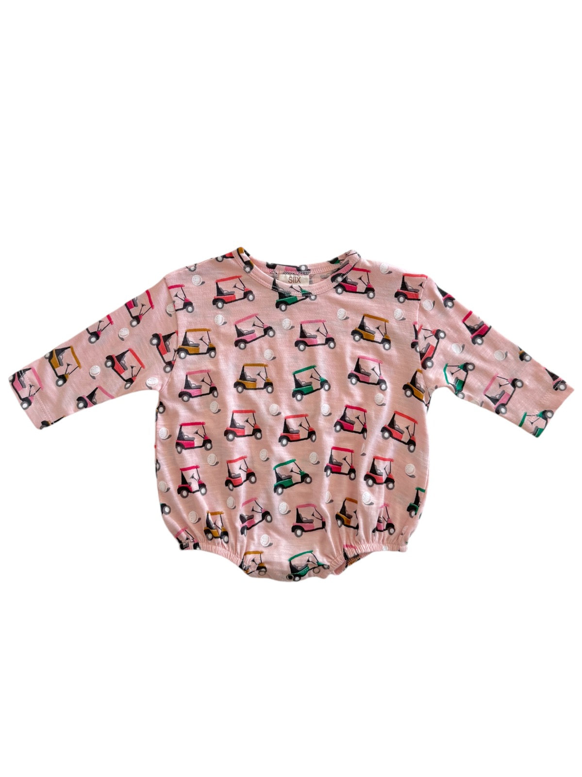 Pink long-sleeve shirt with colorful golf cart and golf ball patterns, featuring elasticized waist.
