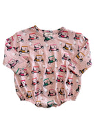 Pink long-sleeve shirt featuring colorful golf carts and golf balls pattern. Ideal for casual wear.