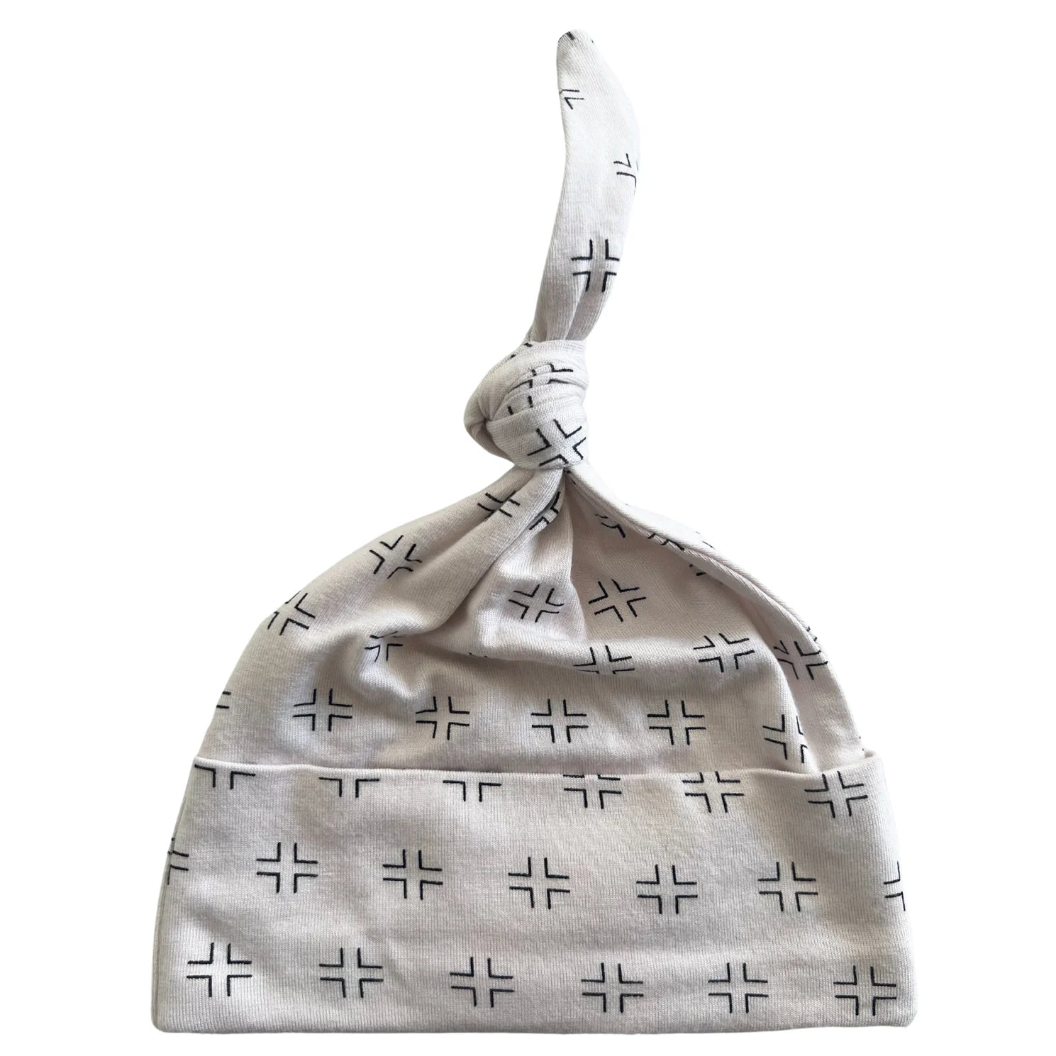 Light gray baby hat with black cross patterns, featuring a knotted top design.