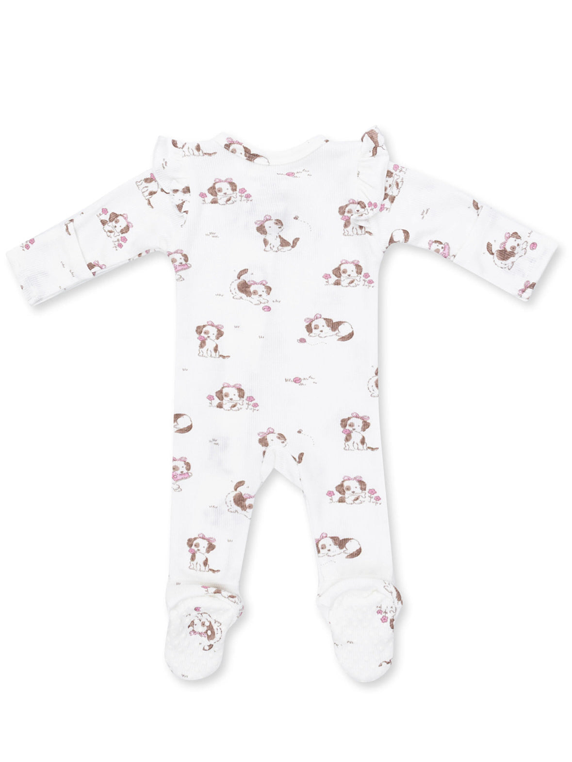 White baby onesie with playful puppy prints and floral accents, featuring long sleeves and footed design.