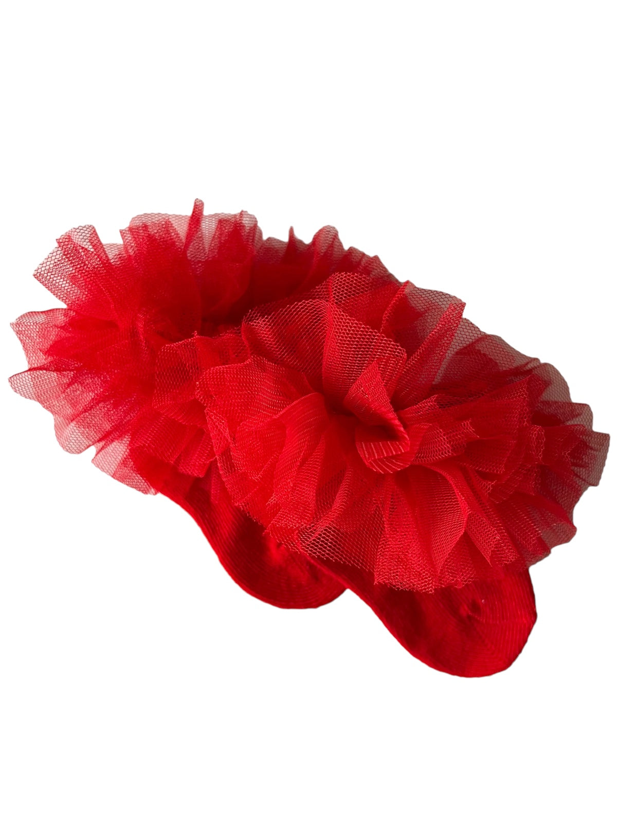 Bright red socks adorned with large, fluffy tulle flowers for a playful and stylish look.