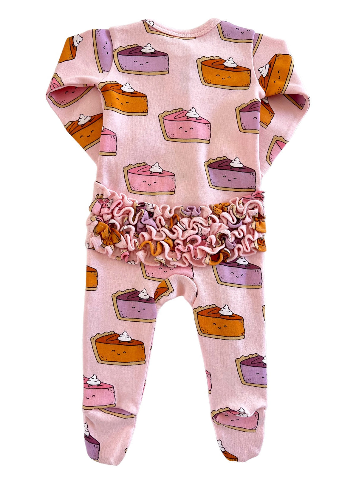 Pink toddler pajamas with dessert prints and a ruffled waistband featuring colorful pie designs.