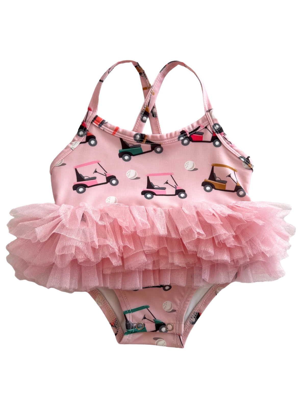 Pink girls' swimsuit with layered tulle ruffle and golf cart pattern on the bodice. Adjustable straps included.