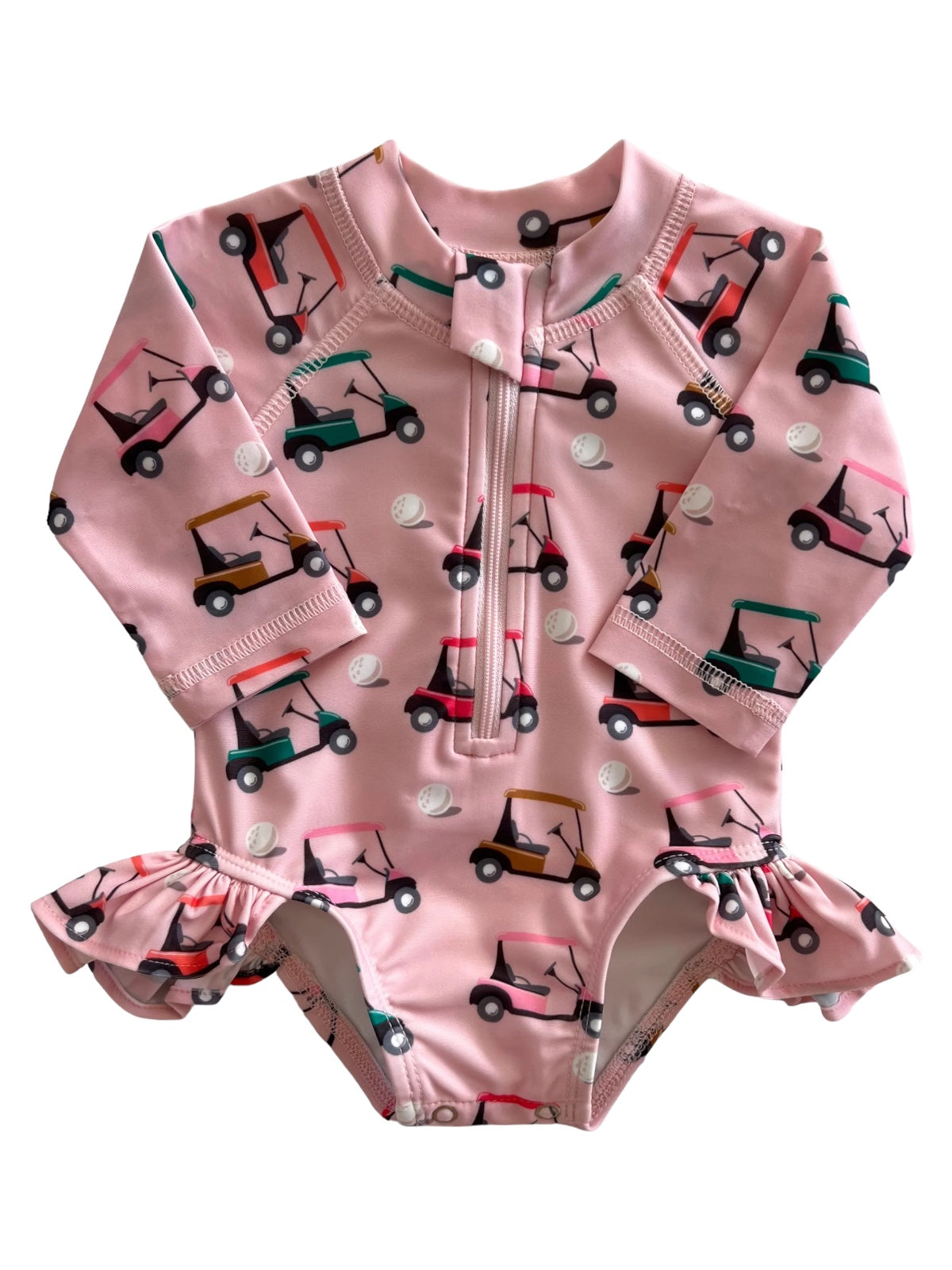 Pink swimsuit with golf cart patterns and ruffle details, featuring a front zipper for easy wear.