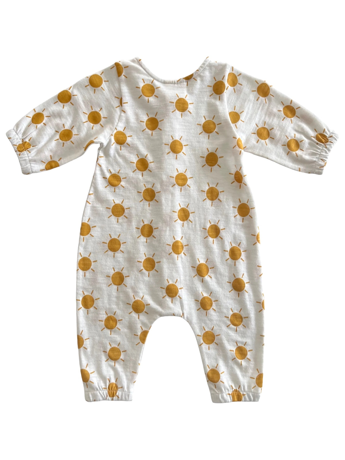 Baby romper with a sunny yellow sun pattern on a white background, featuring long sleeves and elastic cuffs.