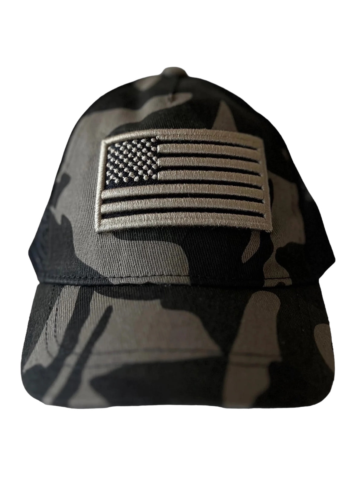 Camo baseball cap with an embroidered American flag on the front.
